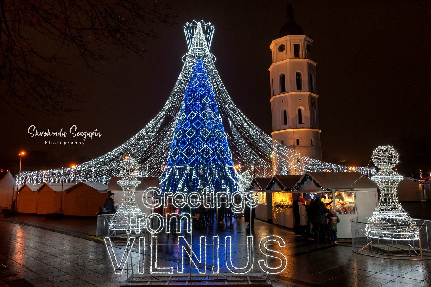 christmas market vilnius lithuania cathedral square blue christmas tree chess pawns design