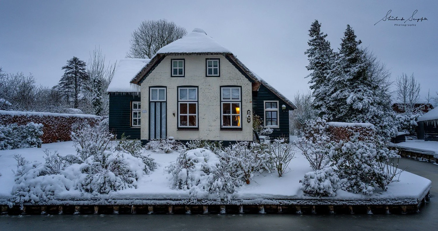winter snow in giethoorn venice of the north village without roads showcasing thatched houses and canals netherlands