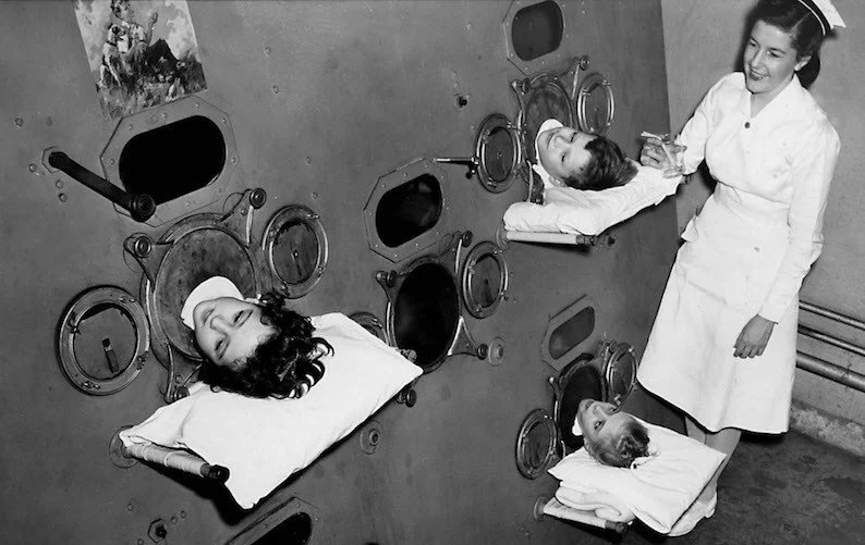 Pictured here in the 1950s, polio patients breathe with the help of an iron lung. (Photos: Boston Children’s Hospital Archives)