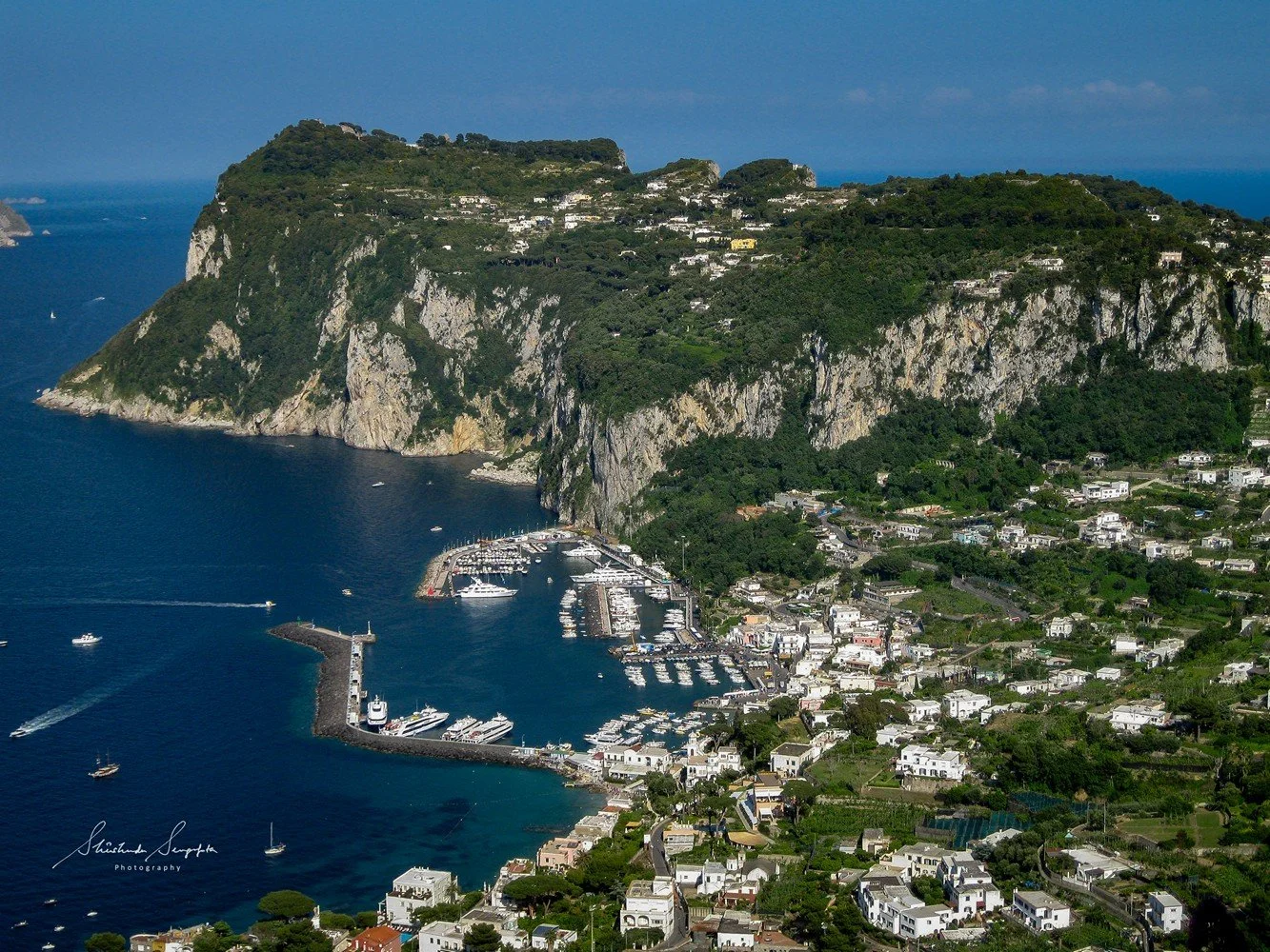 capri island italy featuring limestone rock formation stalagmite stalactite blue grotto cave marina grande and faraglioni