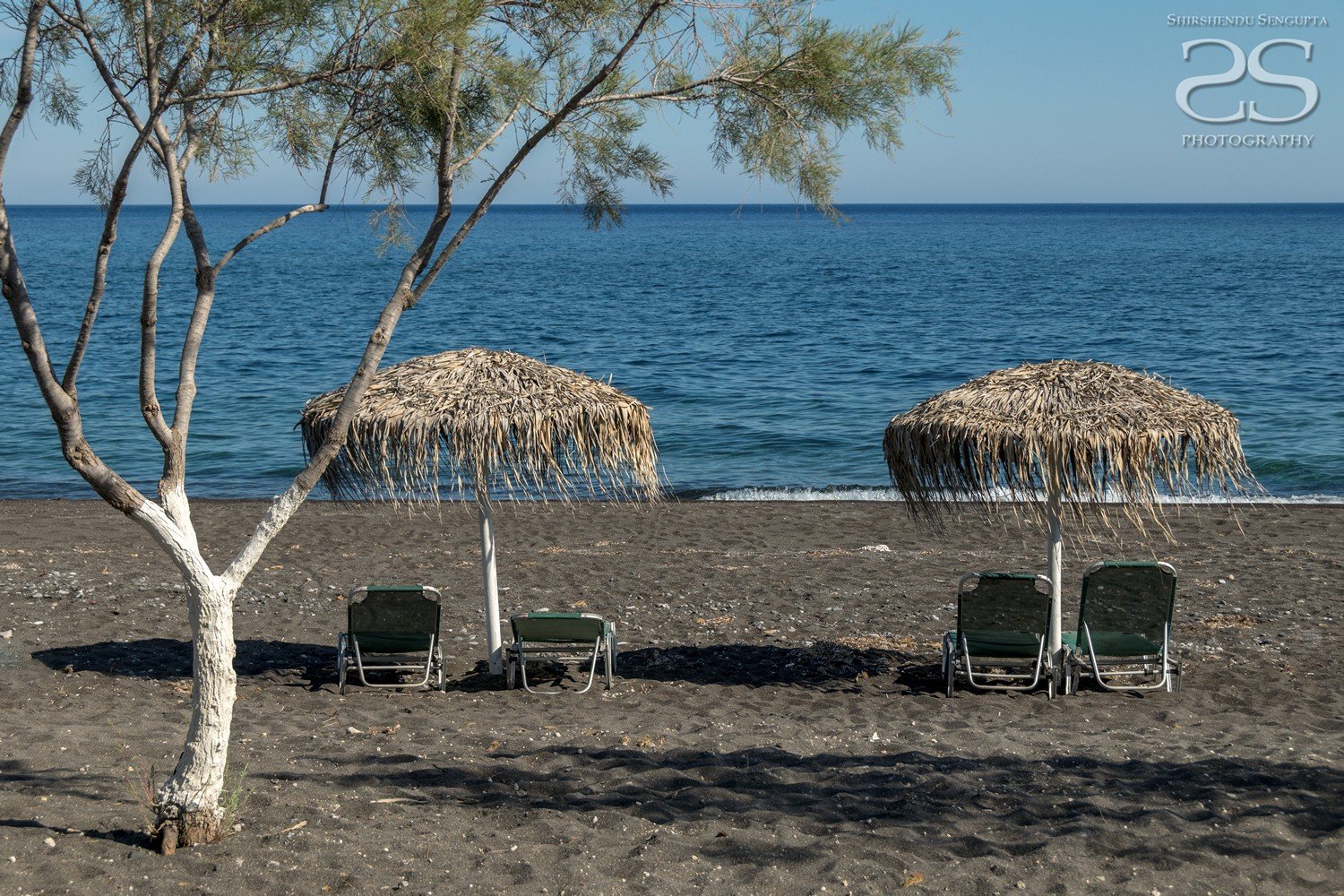 black beach kamari perissa perivolos in satorini island greece