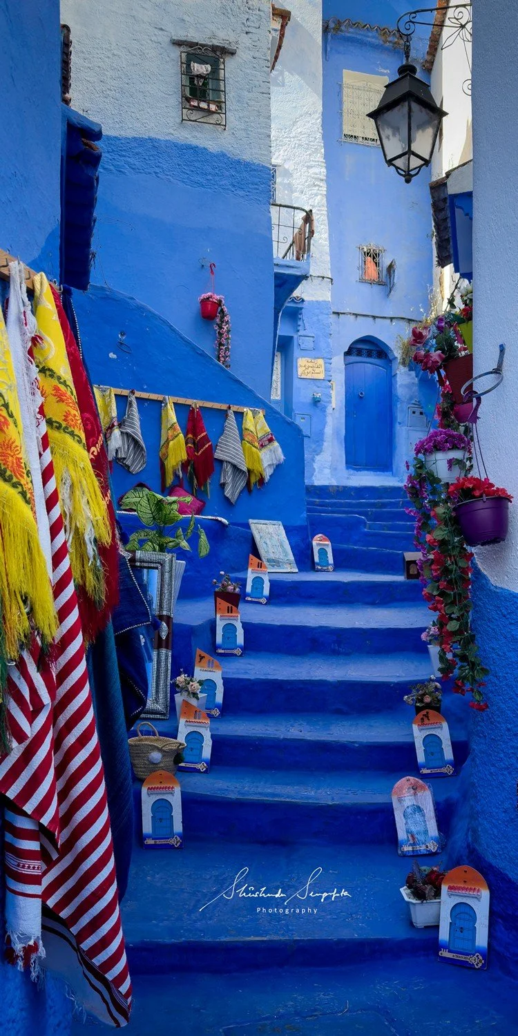 blue city of chefchaouen in morocco africa featuring blue medina alleyways place El Haouta plaza uta el hammam kasbah museum and sunset shot from bouzafer or spanish mosque