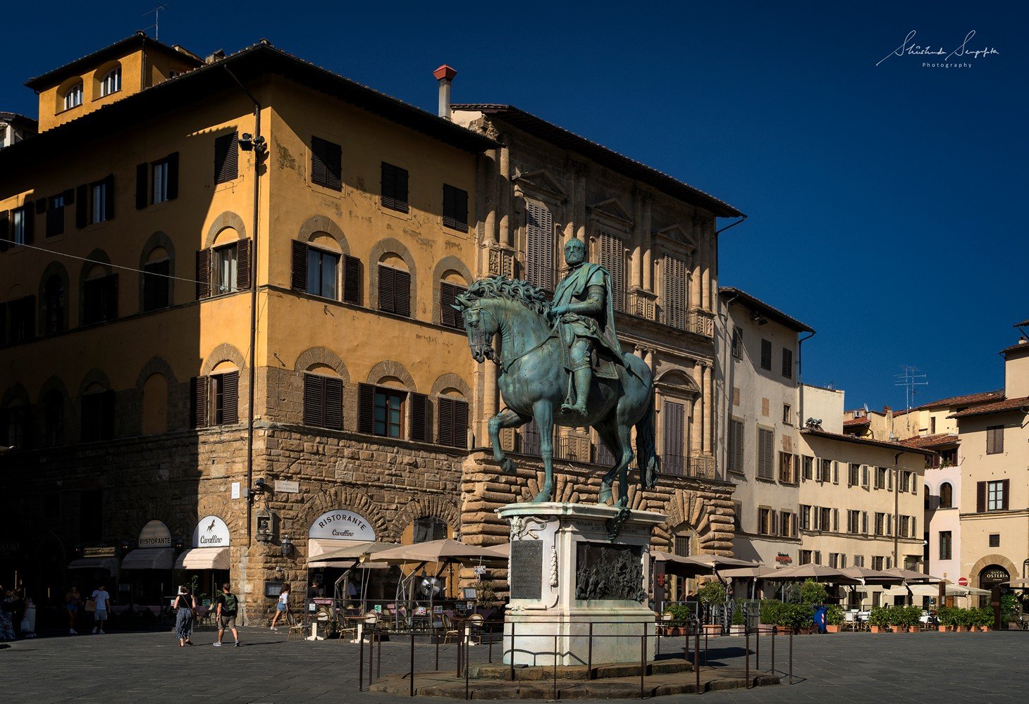 equestrian statue of Cosimo I di Medici in front of palazzo vecchio town hall situated on piazza del signoria in florence tuscany italy shot during summer