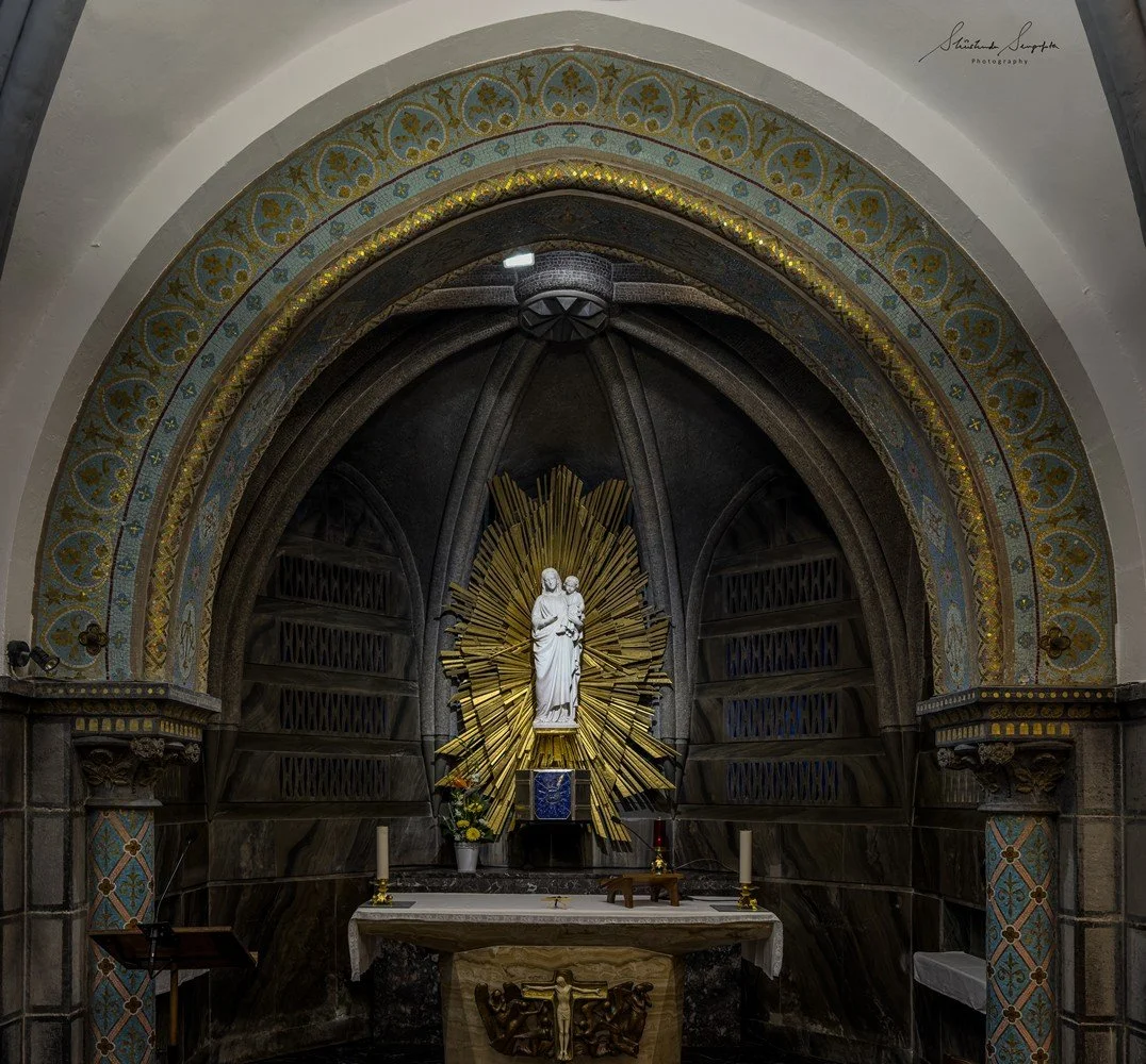 pilgrimage in the city of lourdes france dedicated to Lady Virgin Mary also known as Immaculate Conception who gave apparition to St. Bernadette featuring sanctuary church basilica grotto cave miraculous water and Marian procession
