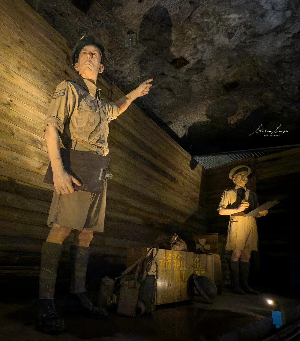 World War II tunnels at gibraltar british overseas territory comprising upper rock housing  hercules pillars macaque monkeys caves tunnels and lower city colonial architecture churches lively squares bustling streets