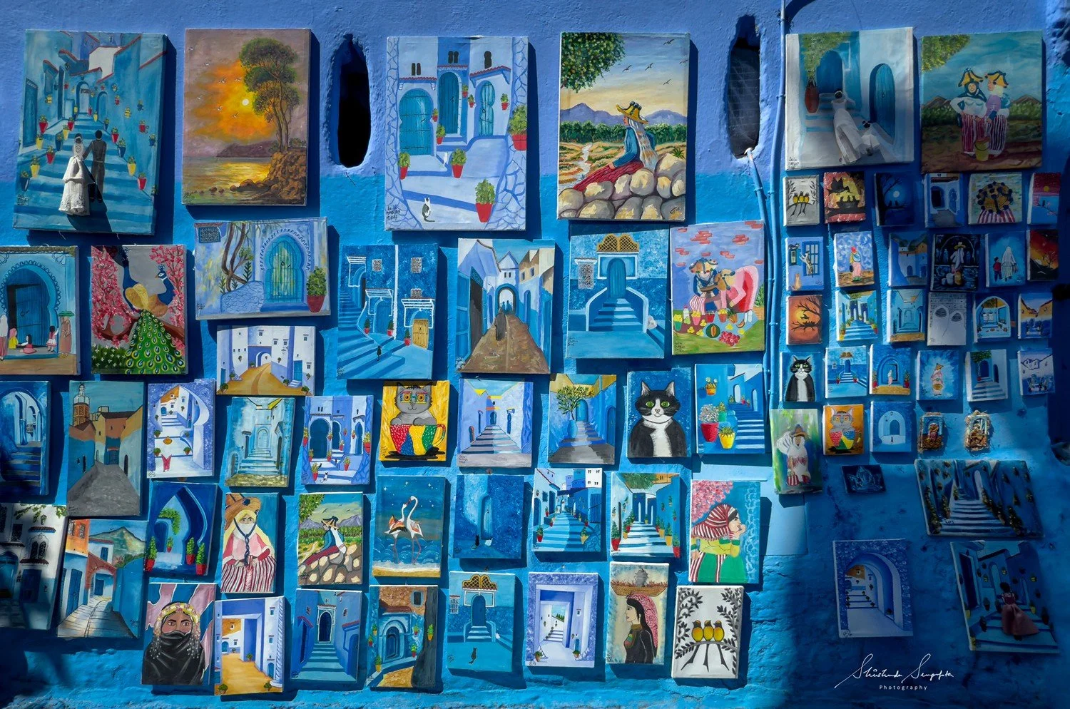 blue city of chefchaouen in morocco africa featuring blue medina alleyways place El Haouta plaza uta el hammam kasbah museum and sunset shot from bouzafer or spanish mosque
