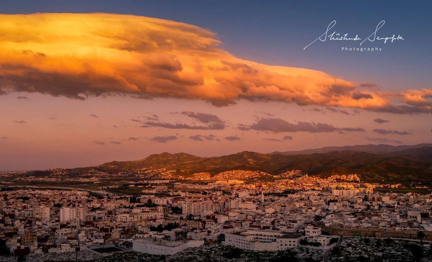 tetouan in morocco africa featuring blue and white palaces museums medina with houses doors windows city gate bab al okla dar el sanaa and oddi madrasa loukach white dove paloma blanca statue and panoramic viewpoint feddan park