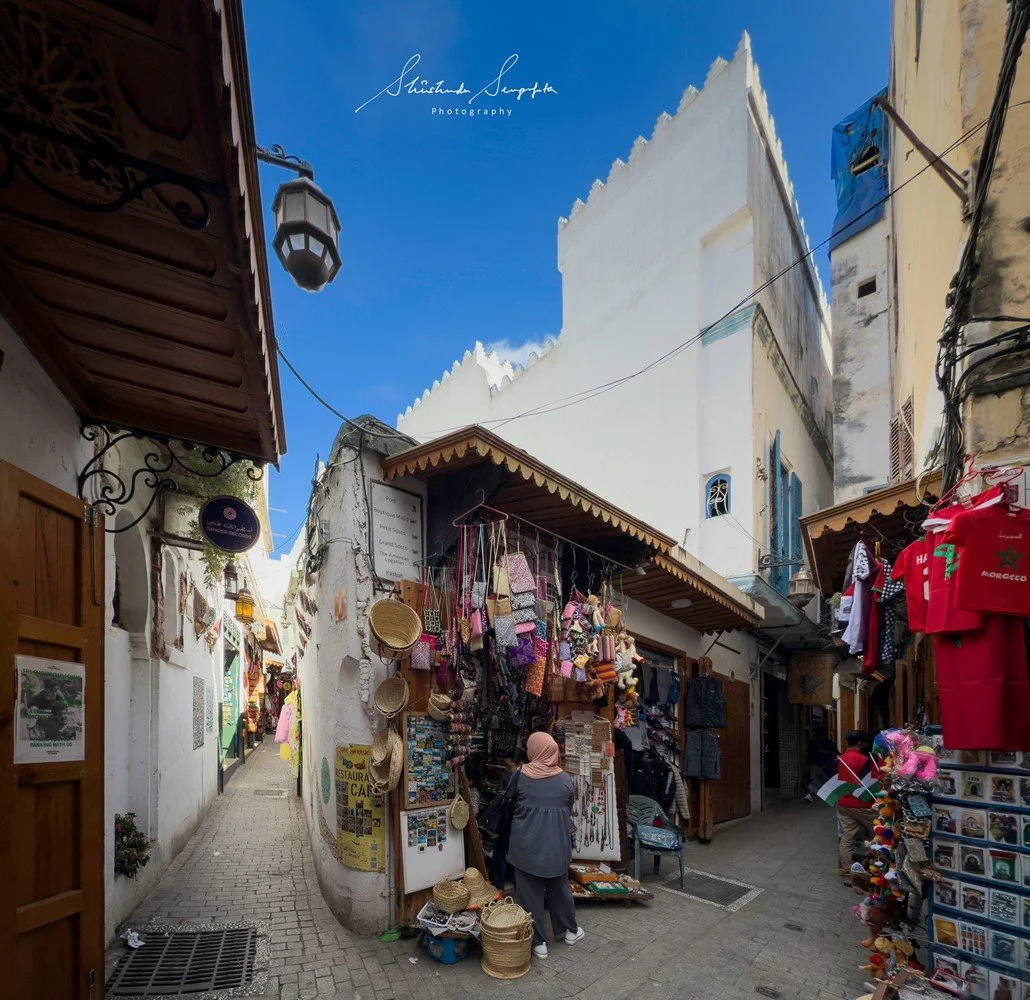 Tangier Morocco Africa featuring white Mosque palace museum kasbah medina qadima doors windows bab al bahr petit grand socco port marina beach