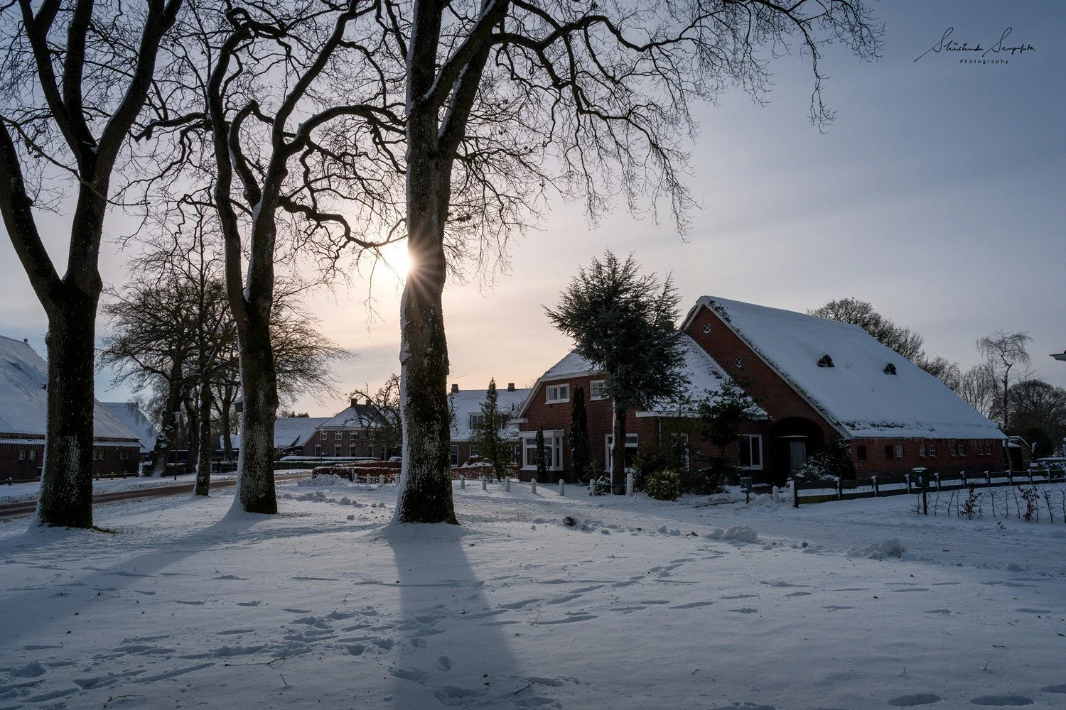 snow at hunebed dolmen stonehenge in drenthe netherlands holland shot during sunset golden hour