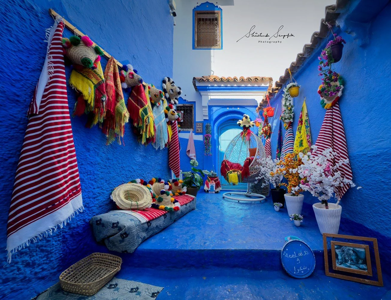 blue city of chefchaouen in morocco africa featuring blue medina alleyways place El Haouta plaza uta el hammam kasbah museum and sunset shot from bouzafer or spanish mosque