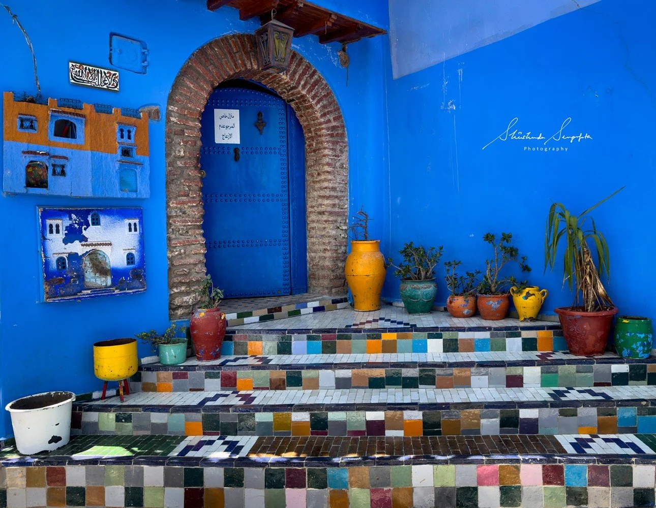 blue city of chefchaouen in morocco africa featuring blue medina alleyways place El Haouta plaza uta el hammam kasbah museum and sunset shot from bouzafer or spanish mosque