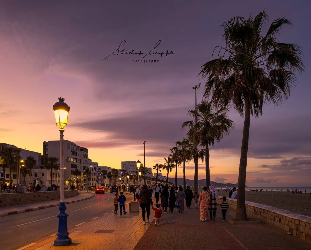 beachside promenade named avenue corniche de martil in morocco africa mediterranean coastal town shot during sunset