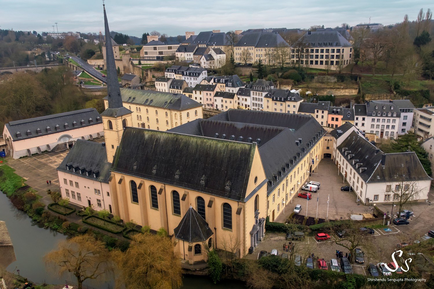 luxembourg city le chemin de la corniche ville haute ville basse grund newmunster abbey at sunset