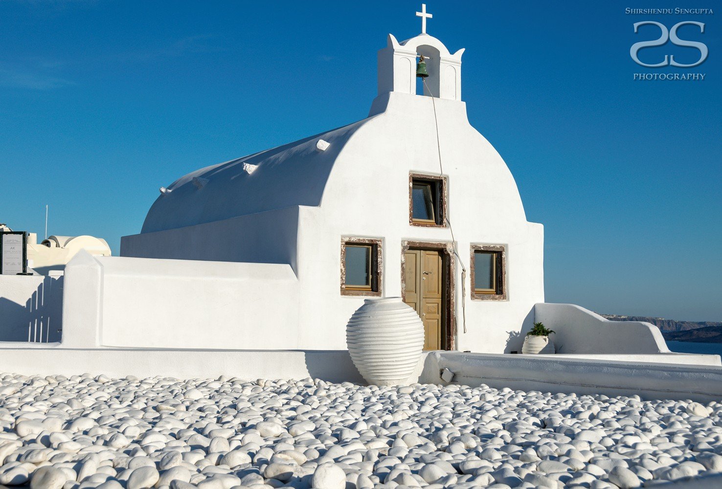 white houses church blue domes oia imerovigli firostefani fira village santorini greece caldera volcanic island