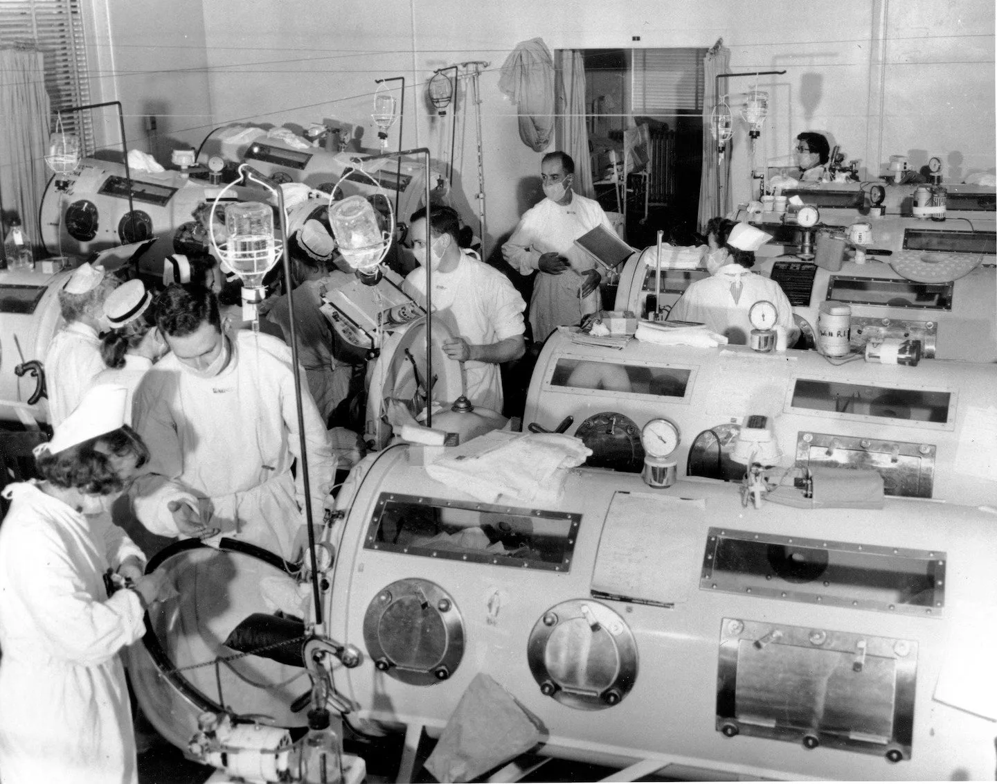 The polio ward in 1955 at Haynes Memorial Hospital in Boston, where iron lung respirators helped patients breathe following cutter incident