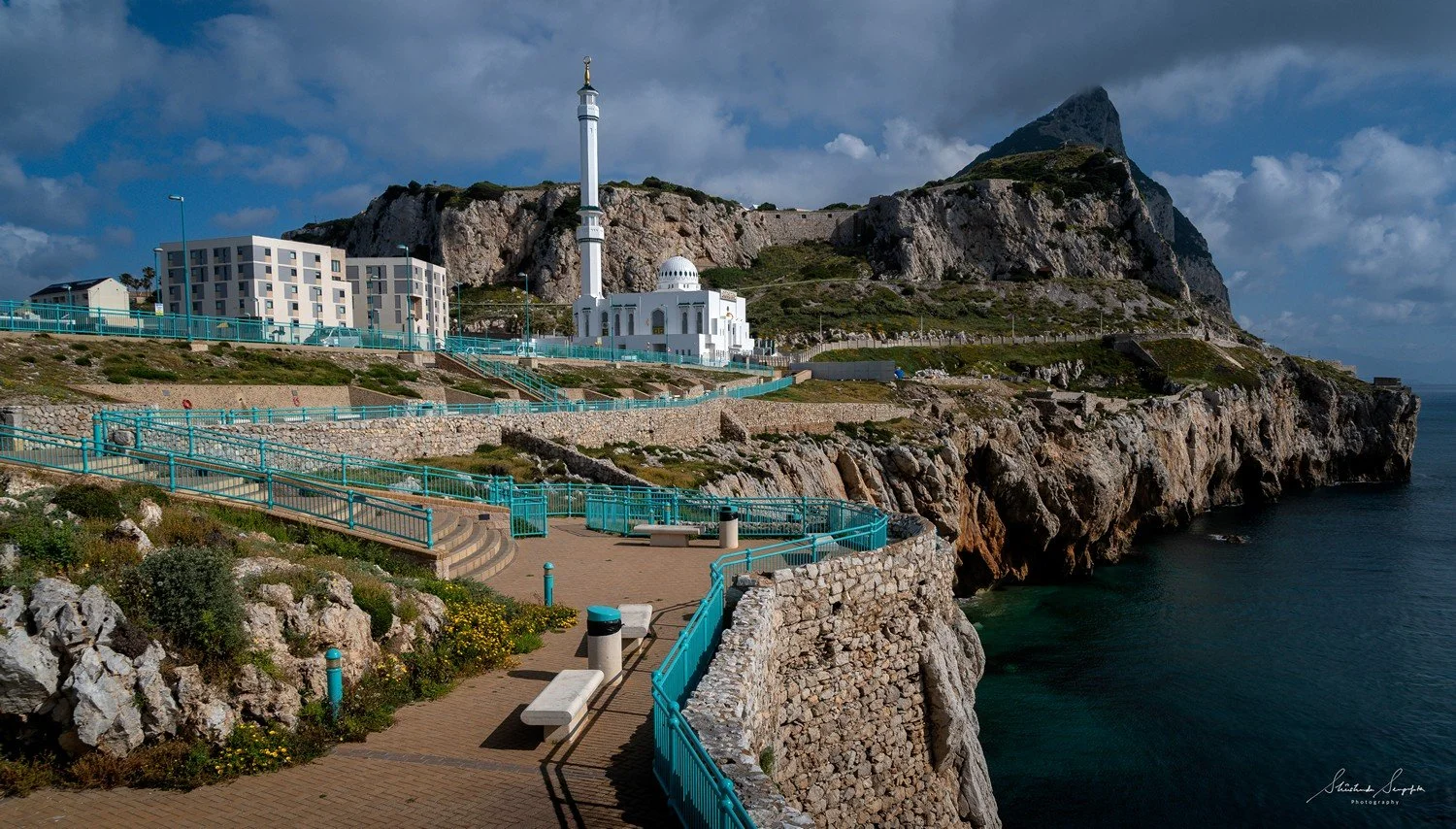 europa point at gibraltar british overseas territory comprising upper rock housing  hercules pillars macaque monkeys caves tunnels and lower city colonial architecture churches lively squares bustling streets