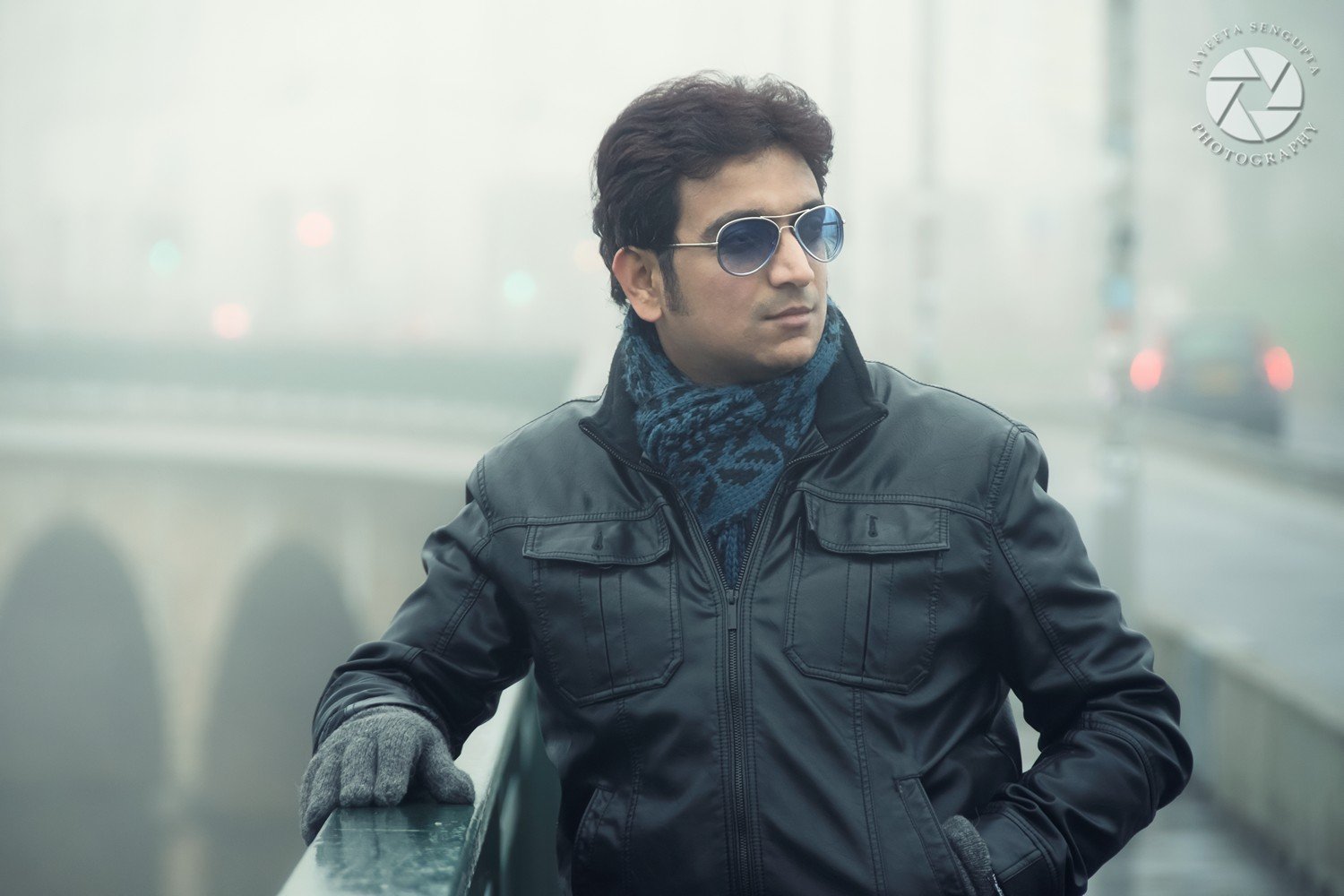 portrait of man with sunglasses and leather jacket standing on pasarelle bridge in luxembourg city ville haute