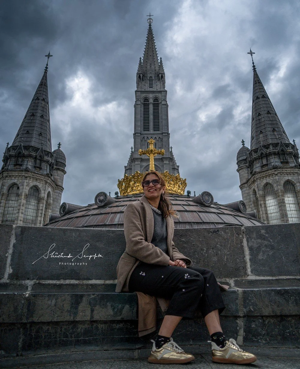 pilgrimage in the city of lourdes france dedicated to Lady Virgin Mary also known as Immaculate Conception who gave apparition to St. Bernadette featuring sanctuary church basilica grotto cave miraculous water and Marian procession