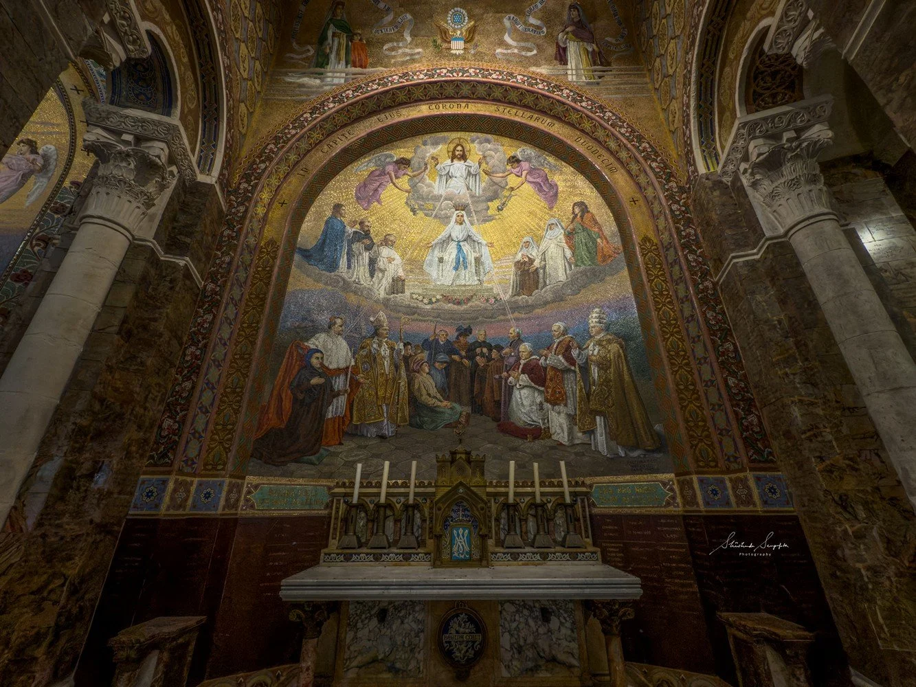 pilgrimage in the city of lourdes france dedicated to Lady Virgin Mary also known as Immaculate Conception who gave apparition to St. Bernadette featuring sanctuary church basilica grotto cave miraculous water and Marian procession