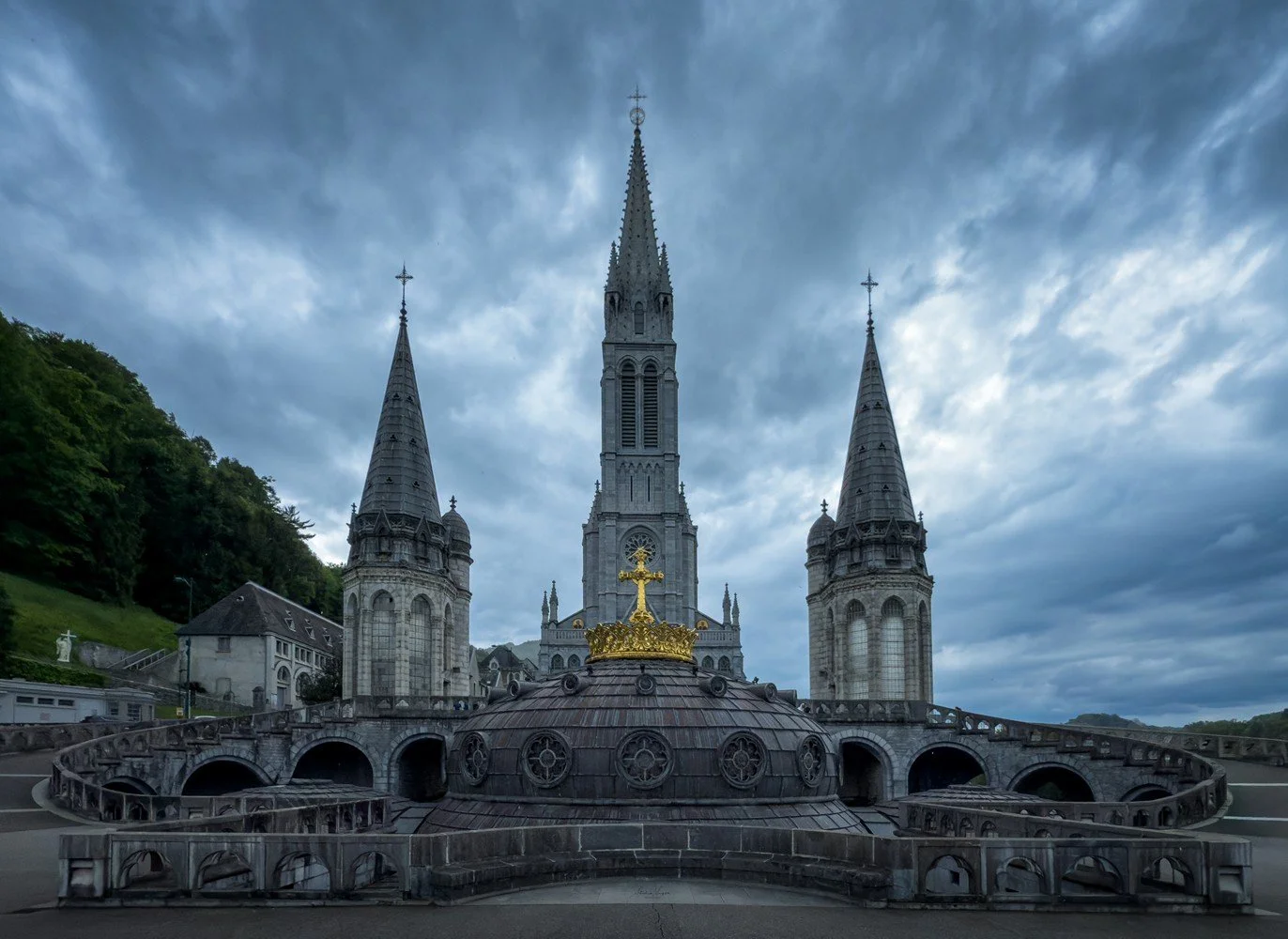 pilgrimage in the city of lourdes france dedicated to Lady Virgin Mary also known as Immaculate Conception who gave apparition to St. Bernadette featuring sanctuary church basilica grotto cave miraculous water and Marian procession