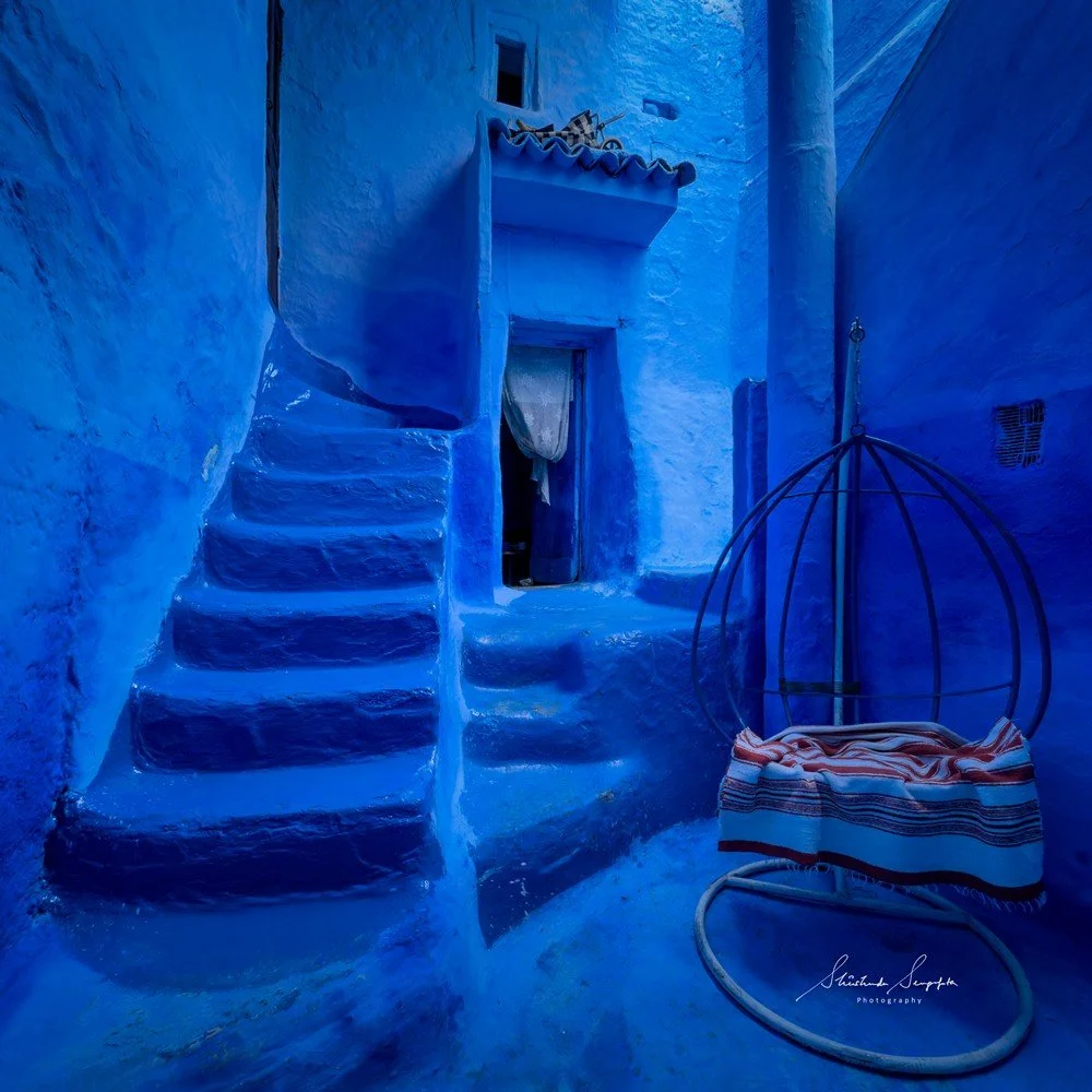blue city of chefchaouen in morocco africa featuring blue medina alleyways place El Haouta plaza uta el hammam kasbah museum and sunset shot from bouzafer or spanish mosque