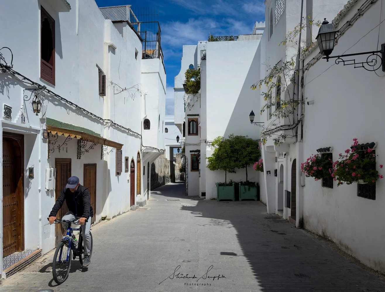 Tangier Morocco Africa featuring white Mosque palace museum kasbah medina qadima doors windows bab al bahr petit grand socco port marina beach