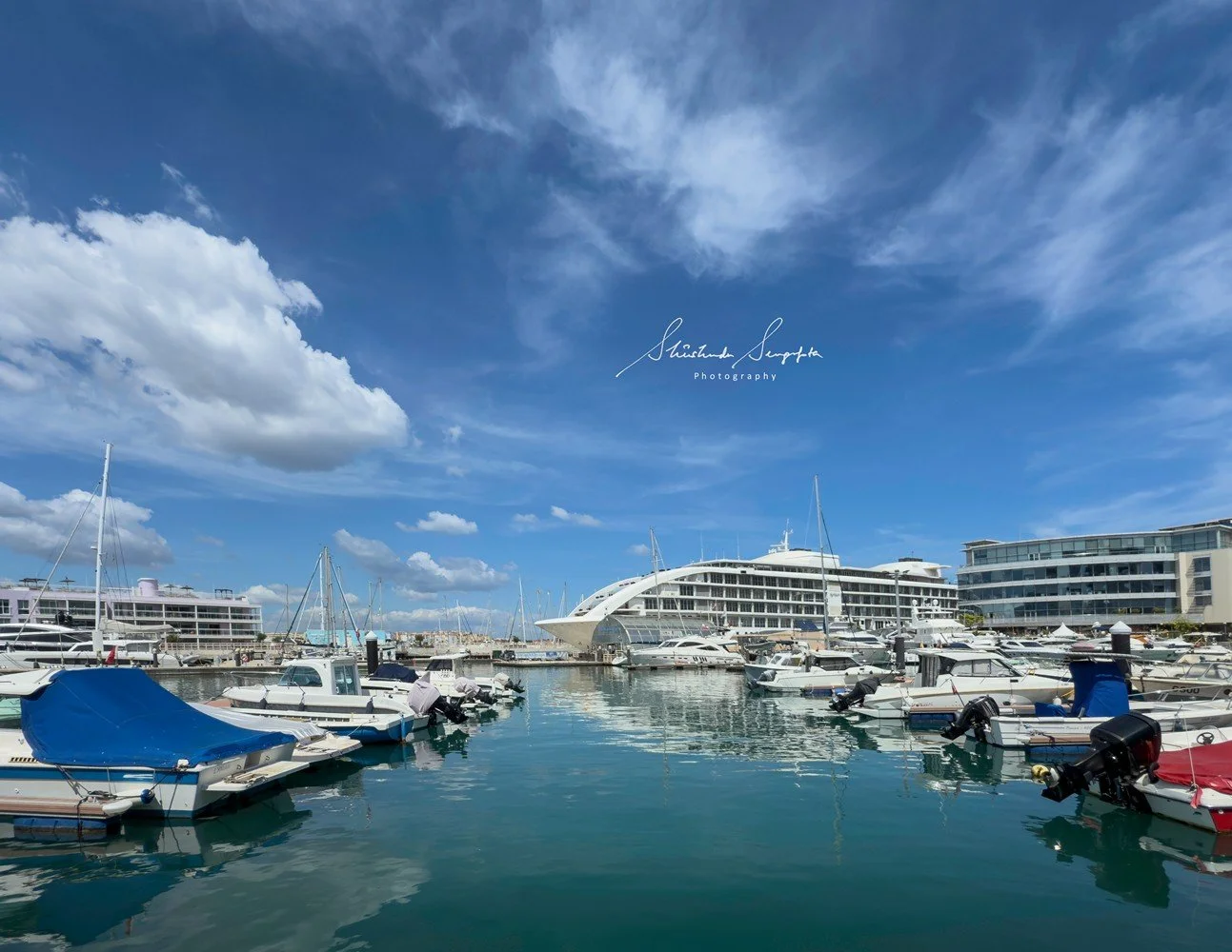 ocean village at gibraltar british overseas territory comprising upper rock housing  hercules pillars macaque monkeys caves tunnels and lower city colonial architecture churches lively squares bustling streets