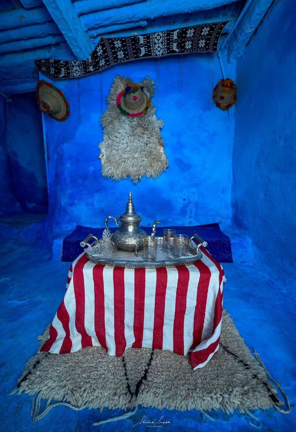 blue city of chefchaouen in morocco africa featuring blue medina alleyways place El Haouta plaza uta el hammam kasbah museum and sunset shot from bouzafer or spanish mosque