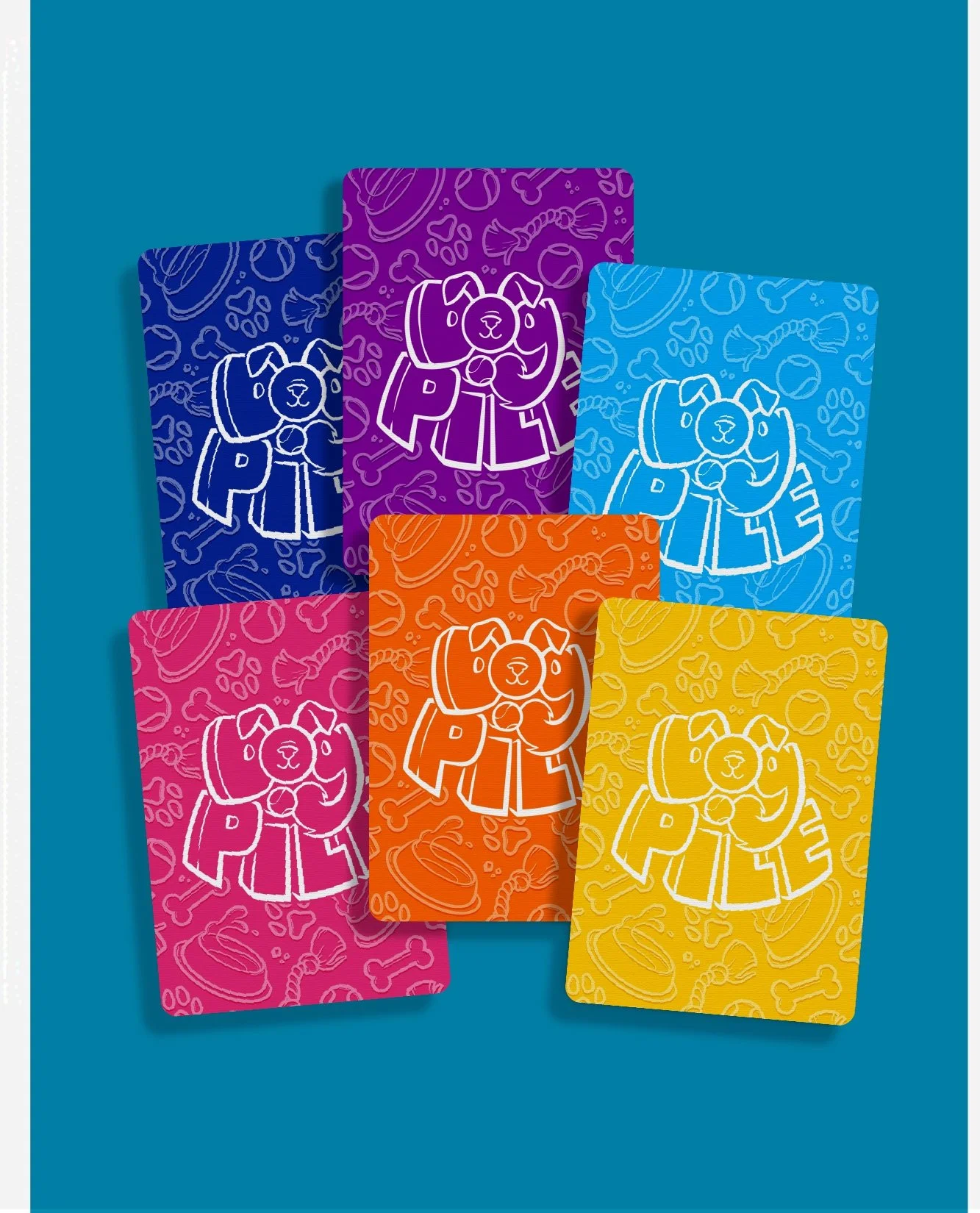Spread of colorful playing cards for the game "Dog Pile"