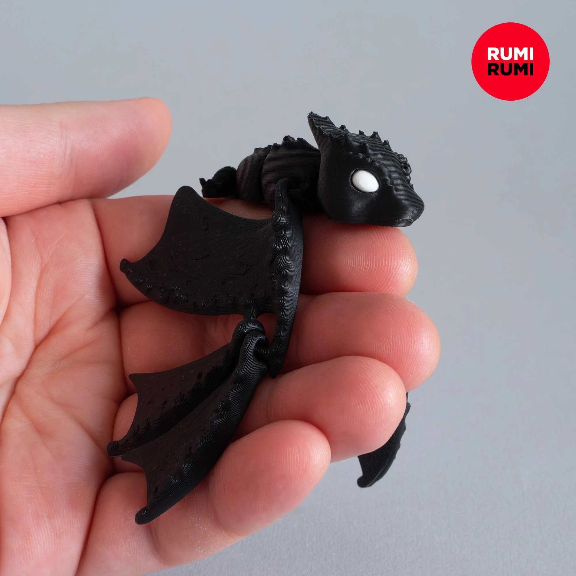 Flexi_Baby_Dragon_Dark_by_RumiRumi_01.jpg