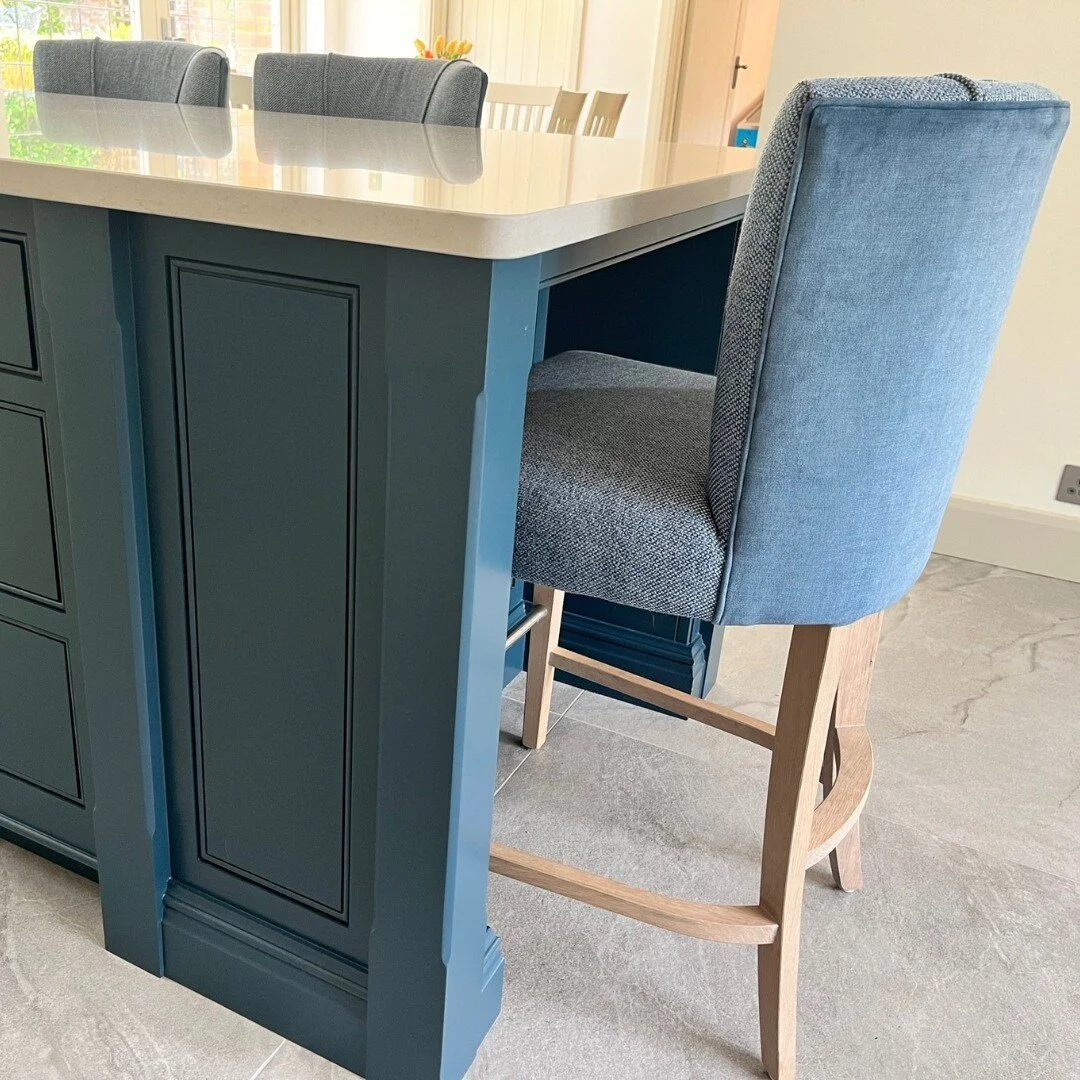 I helped design this island with a niche for the bar stools rather than just a work top overhang. Next challenge was to find the right look for the bar stools, but 'off the shelf' ones just didn't work.
So we had these custom made in a co-ordinating 