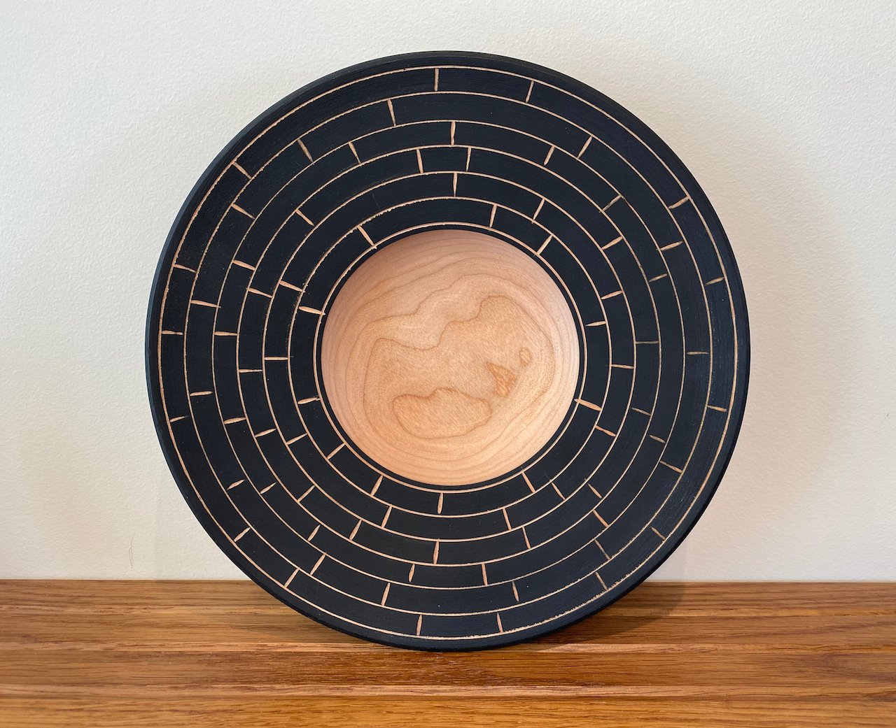 Painted and carved platter