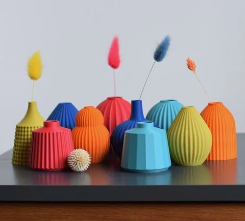 Colourful ribbed and fluted 3D printed vases by designer Keeley Traae