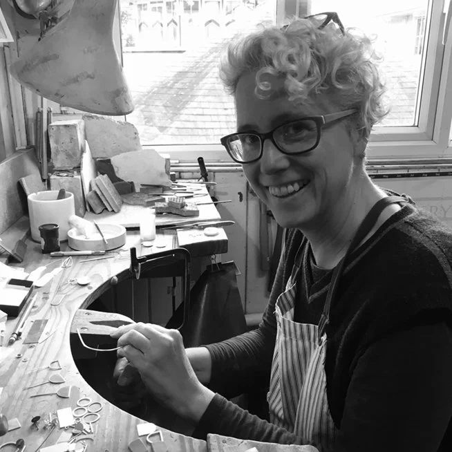 Jeweller Annabet Wyndham working at her bench in her Brighton studio