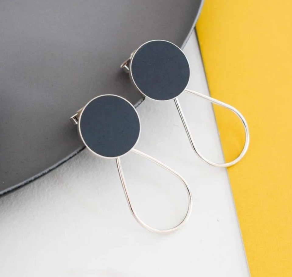 Grey resin and silver drop earrings handmade by contemporary jeweller Claire Lowe