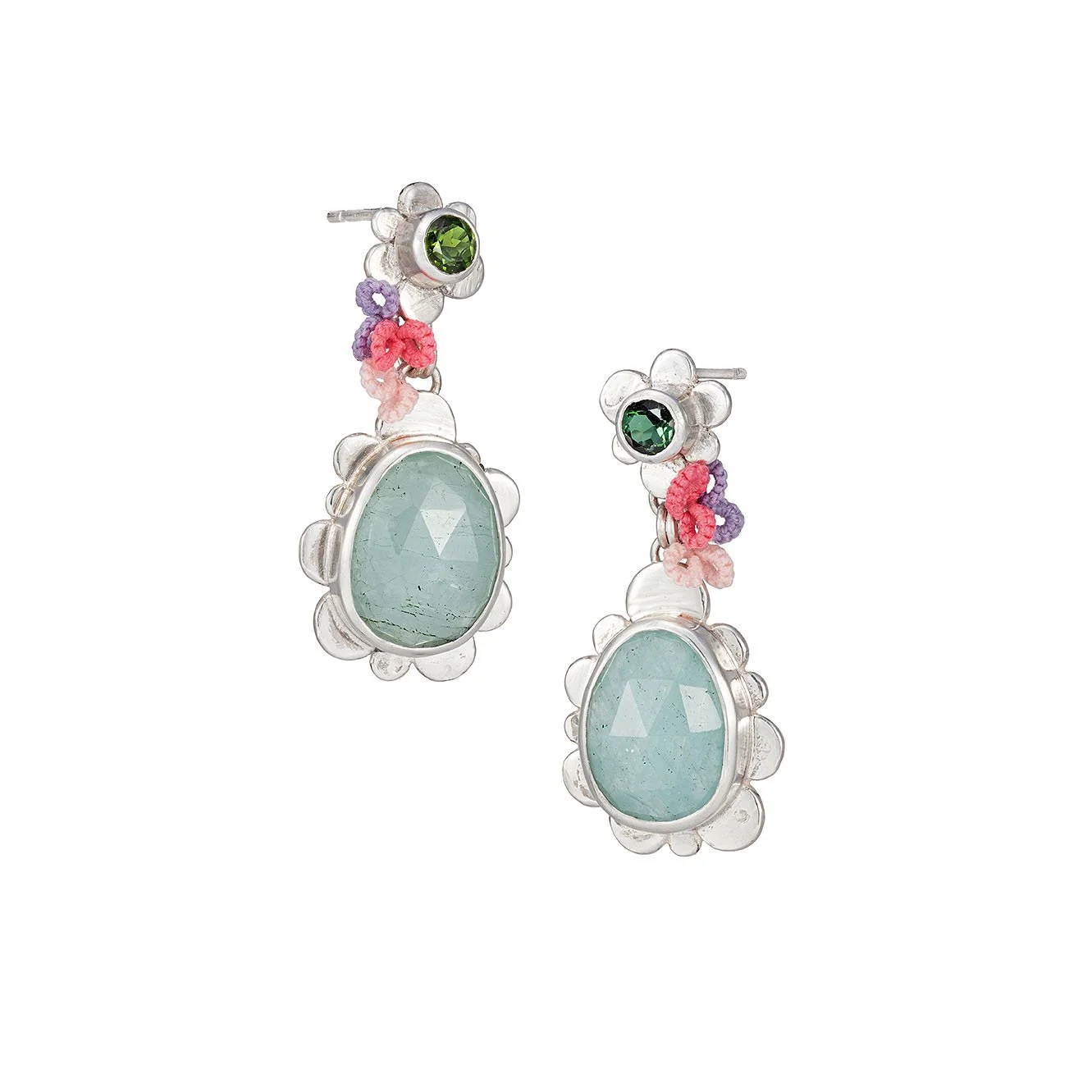 Pair of silver earrings with large oval green gemstones, floral accents, and smaller purple and pink beads.