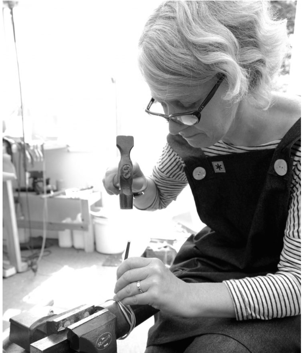 Jeweller Adele Taylor working at her bench in her Sheffield studio