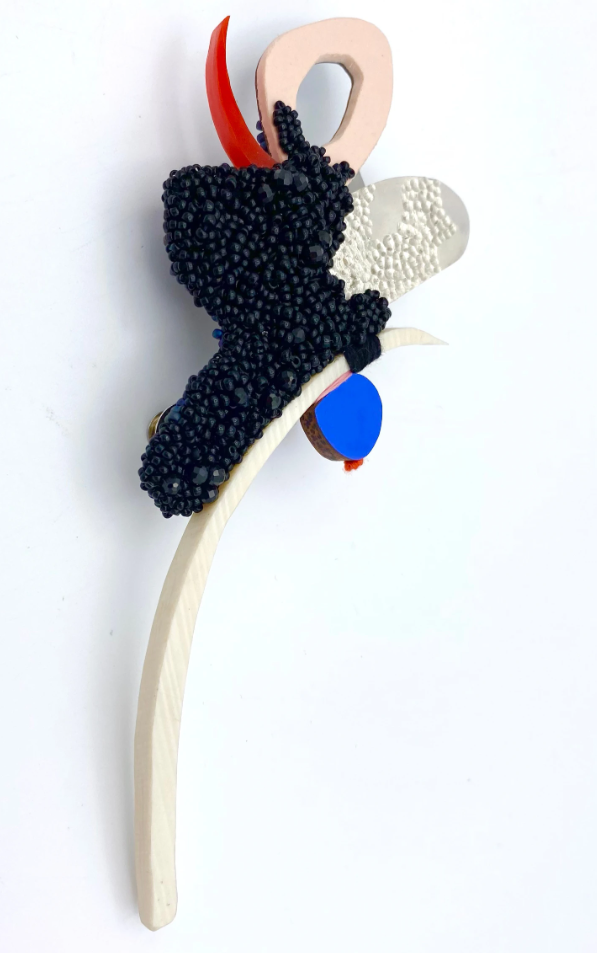 Mixed media statement brooch handmade by contemporary jeweller Faye Hall