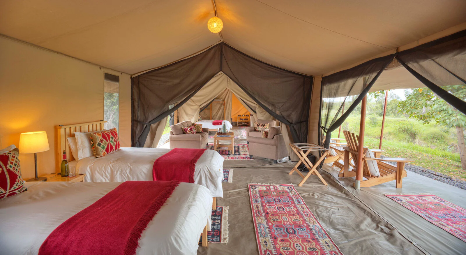 Asilia-Ol-Pejeta-Bush-Camp---Family-Room---Twin-set-up-with-view-into-lounge-and-main-bedroom.jpg