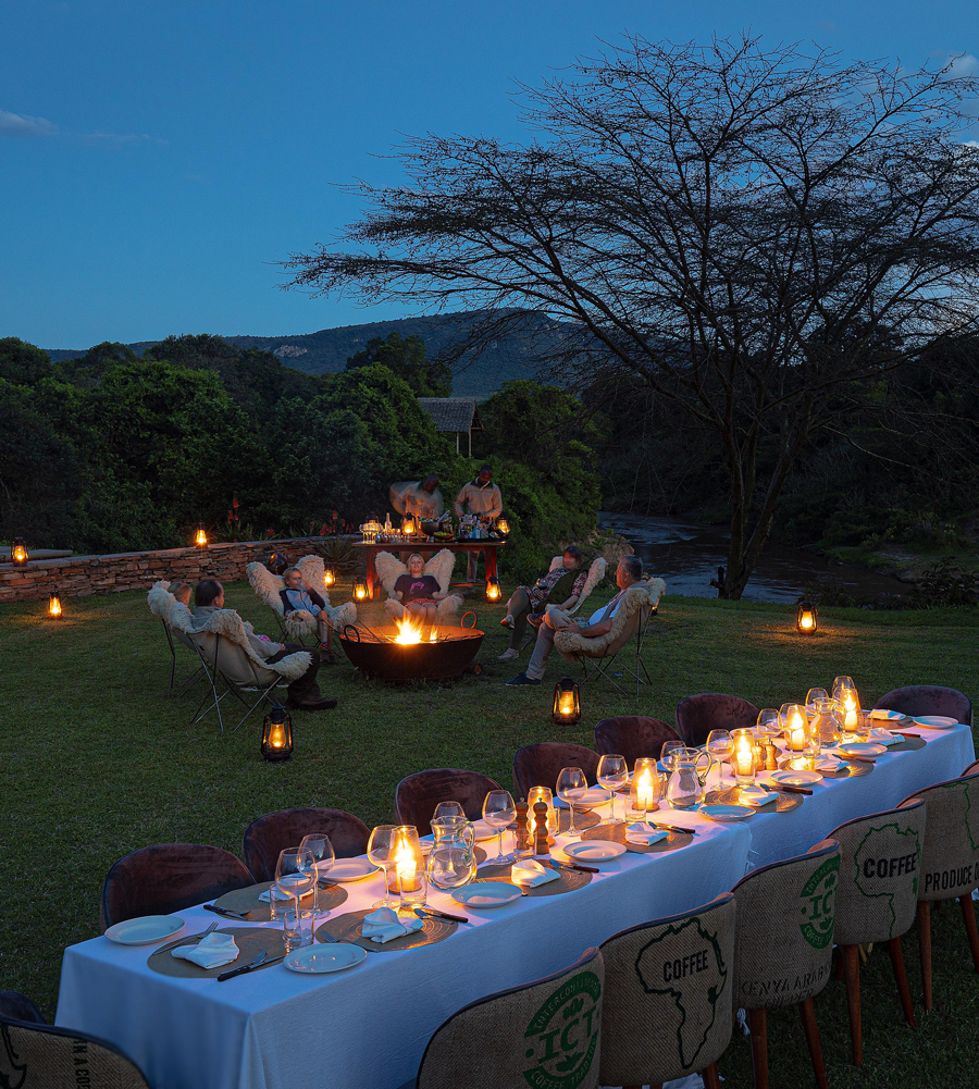 Eksklusiv safari lodge i Afrika med levende lys og bærekraftig luksus