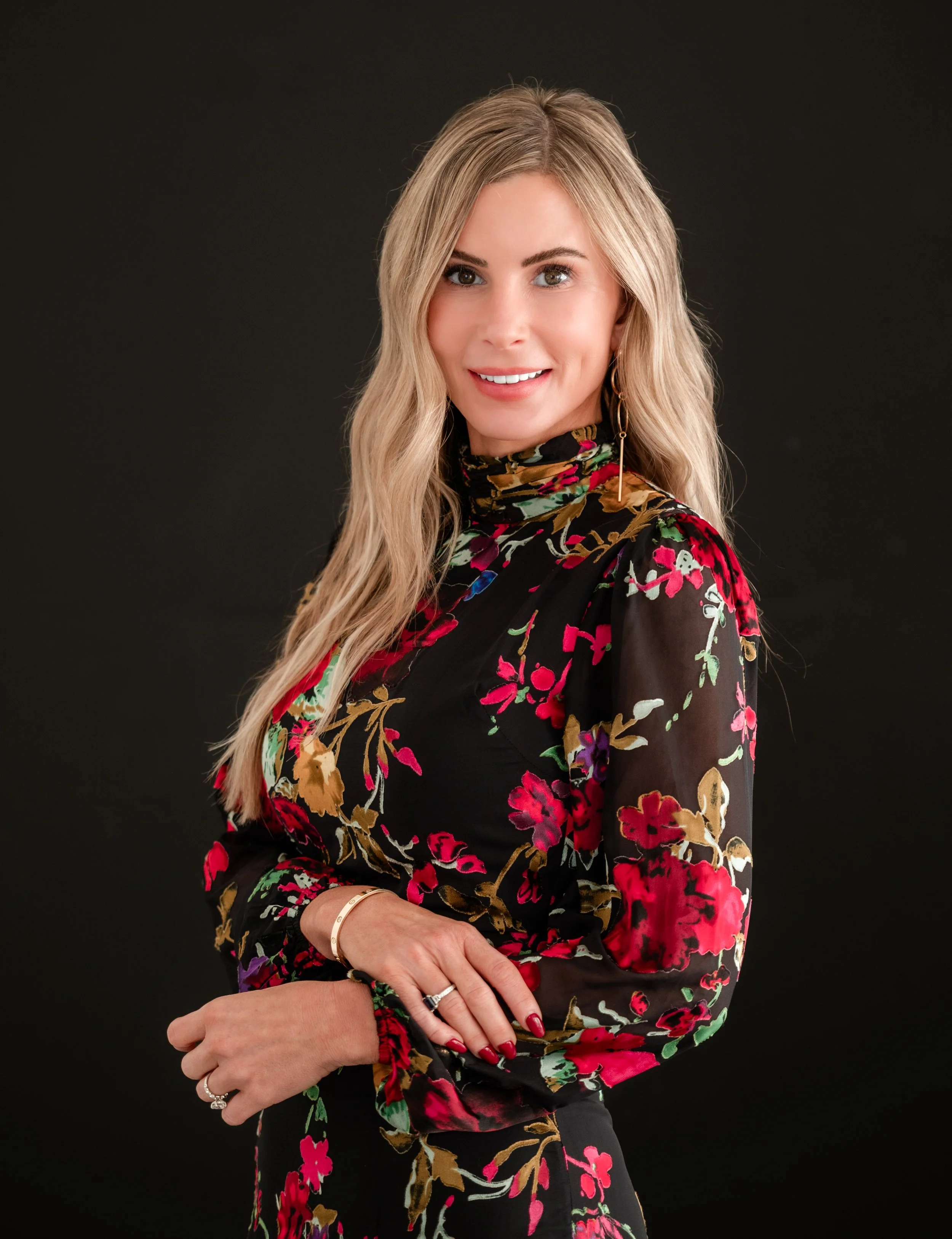 A modern Headshot session of female with black back drop  by Amanda J Designs Photography in Louisville, KY.