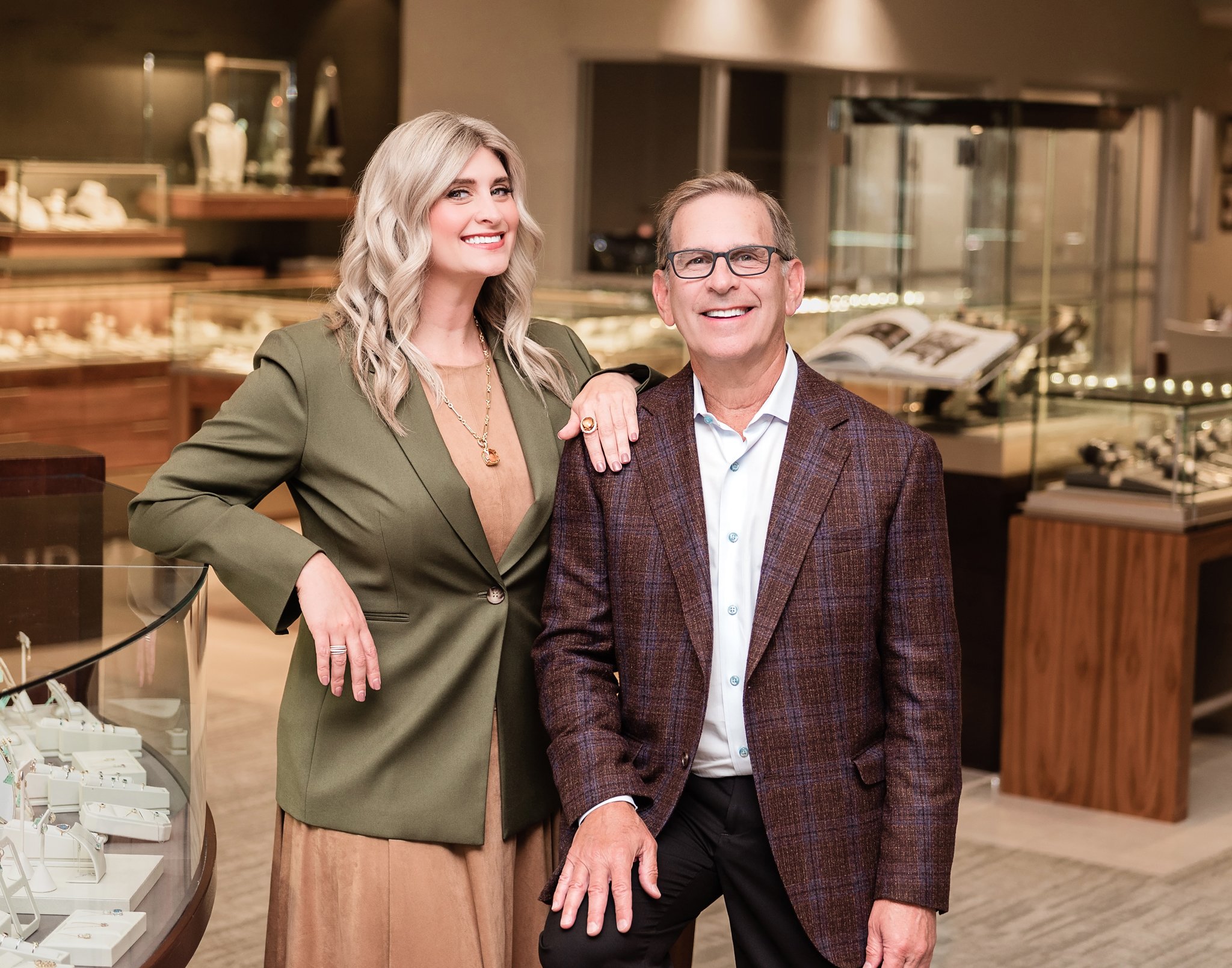 Personal branding photos for a Louisville Jewelry store Father and Daughter team in Louisville, KY by Amanda J Designs Photography.  owner in a luxury aesthetic office by Amanda J Designs Photography.