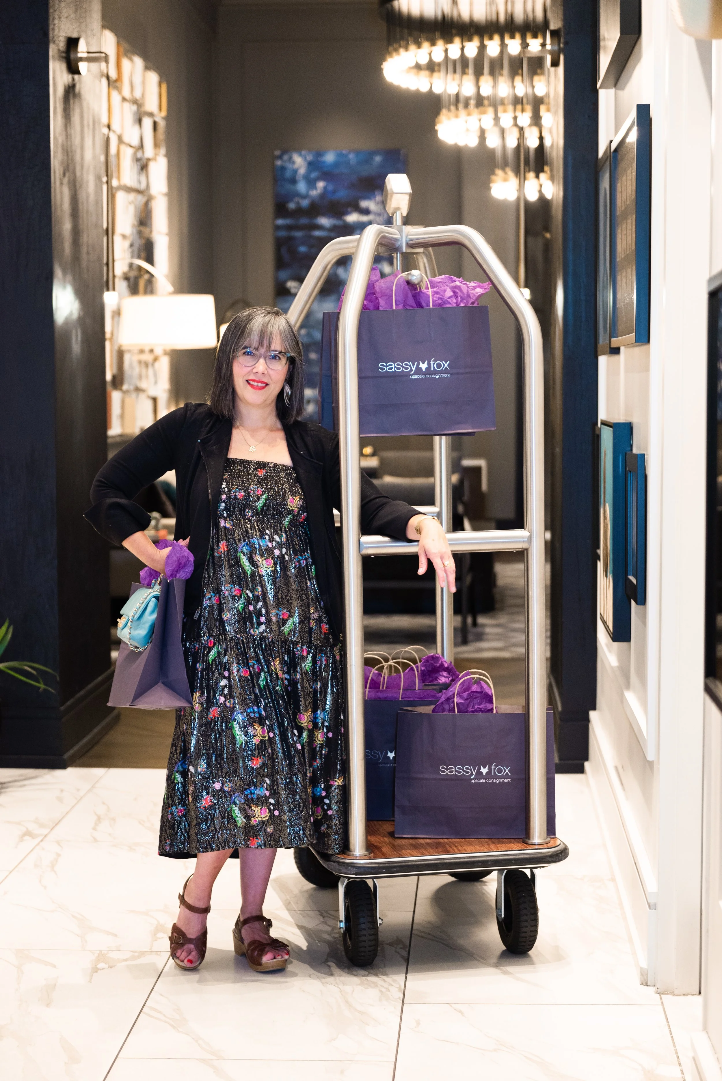 Magazine Portrait, Marketing Photo for Upscale Consignment shop. Female with bell/lugage cart in Louisville, KY by Amanda J Designs Photography. 