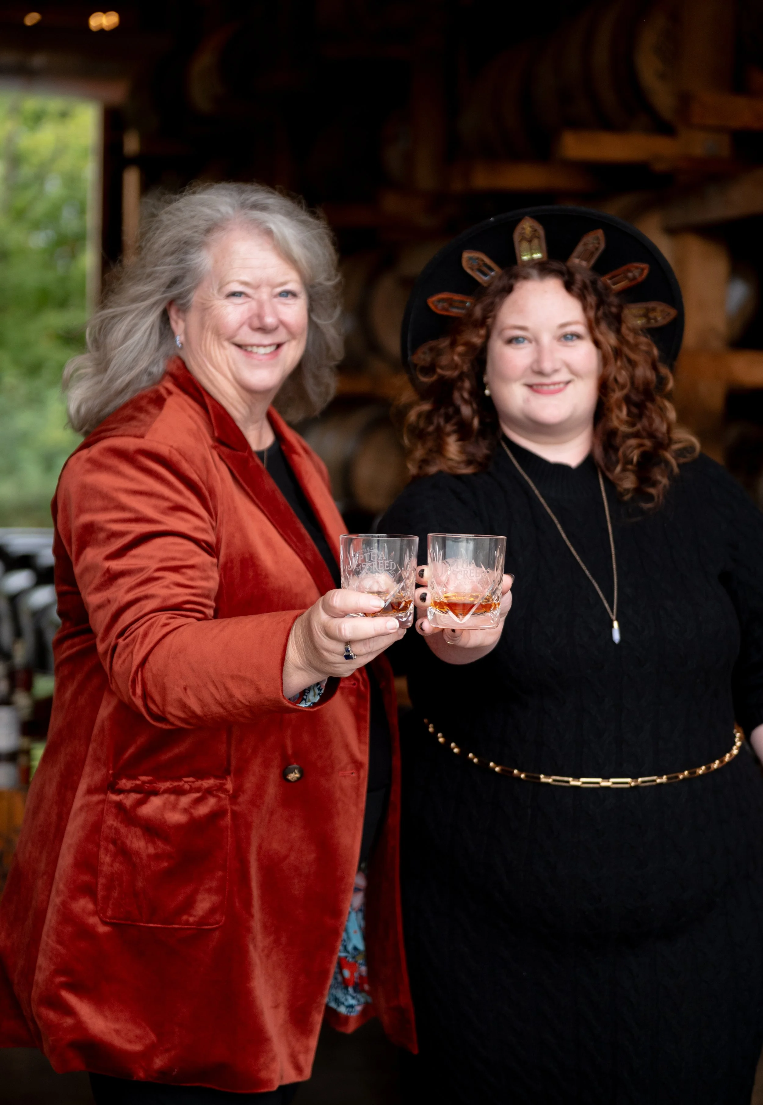 Branding photography for Jeptha Creed Bourbon, Mom and daughter toasting with bourbon in hand by Amanda J Designs Photography in Shelbyville, KY.