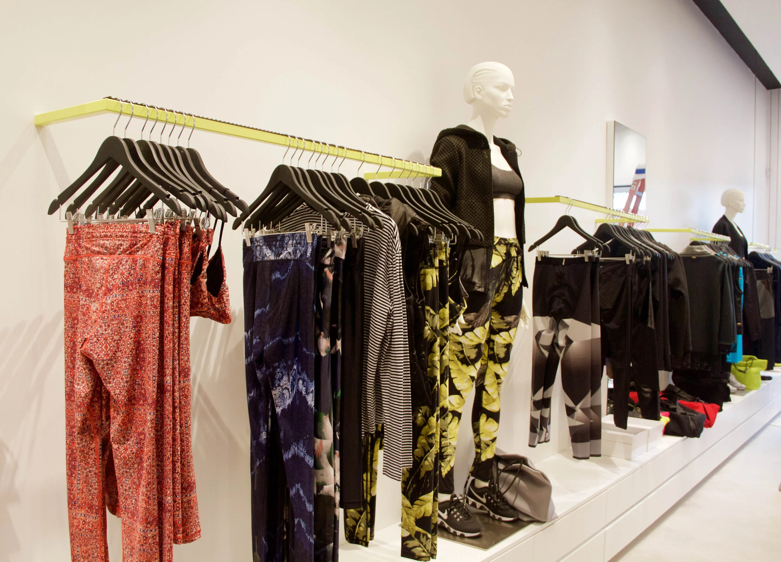 Clothing rack installation and wall product display