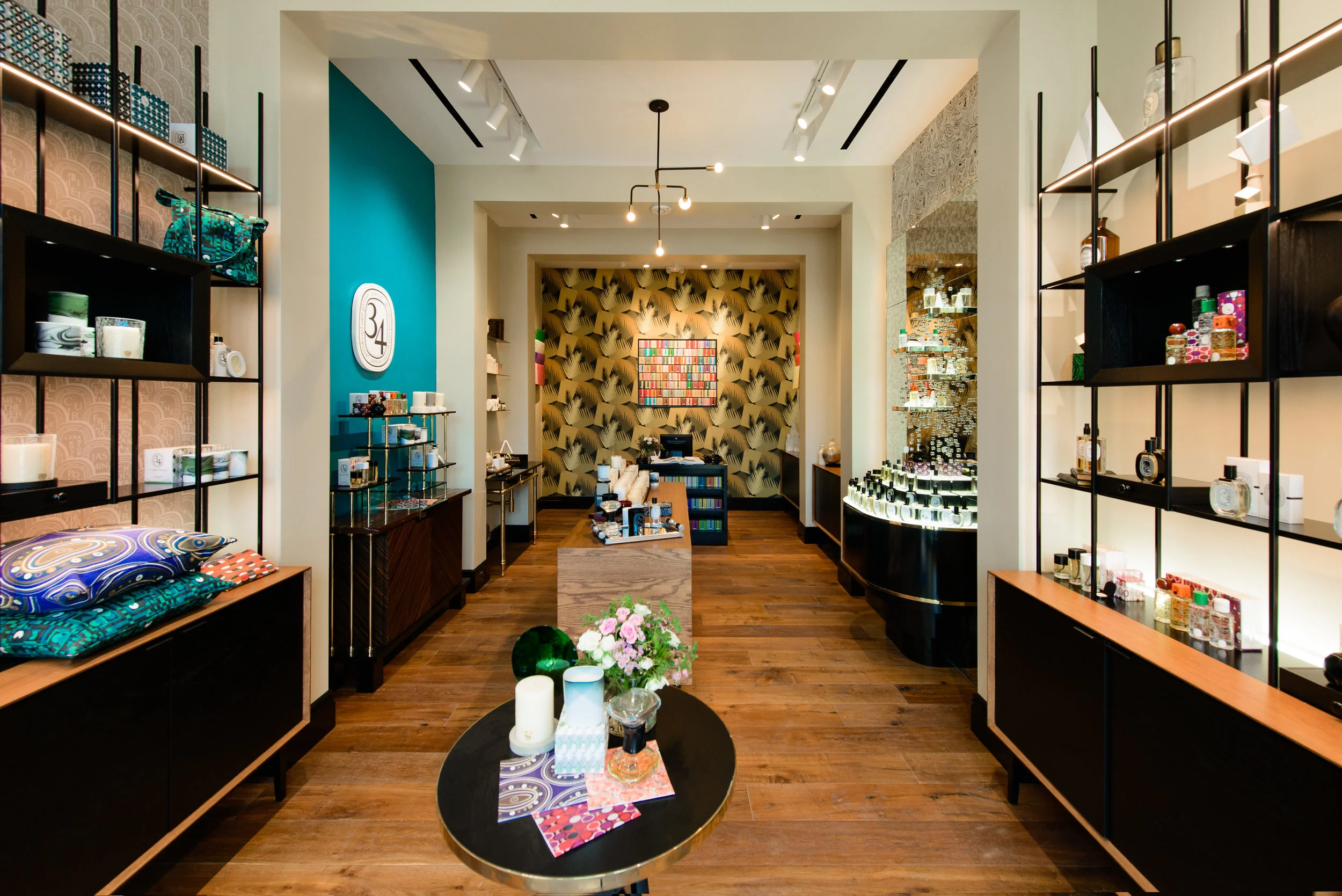 Retail interior with wall displays and centered display tables