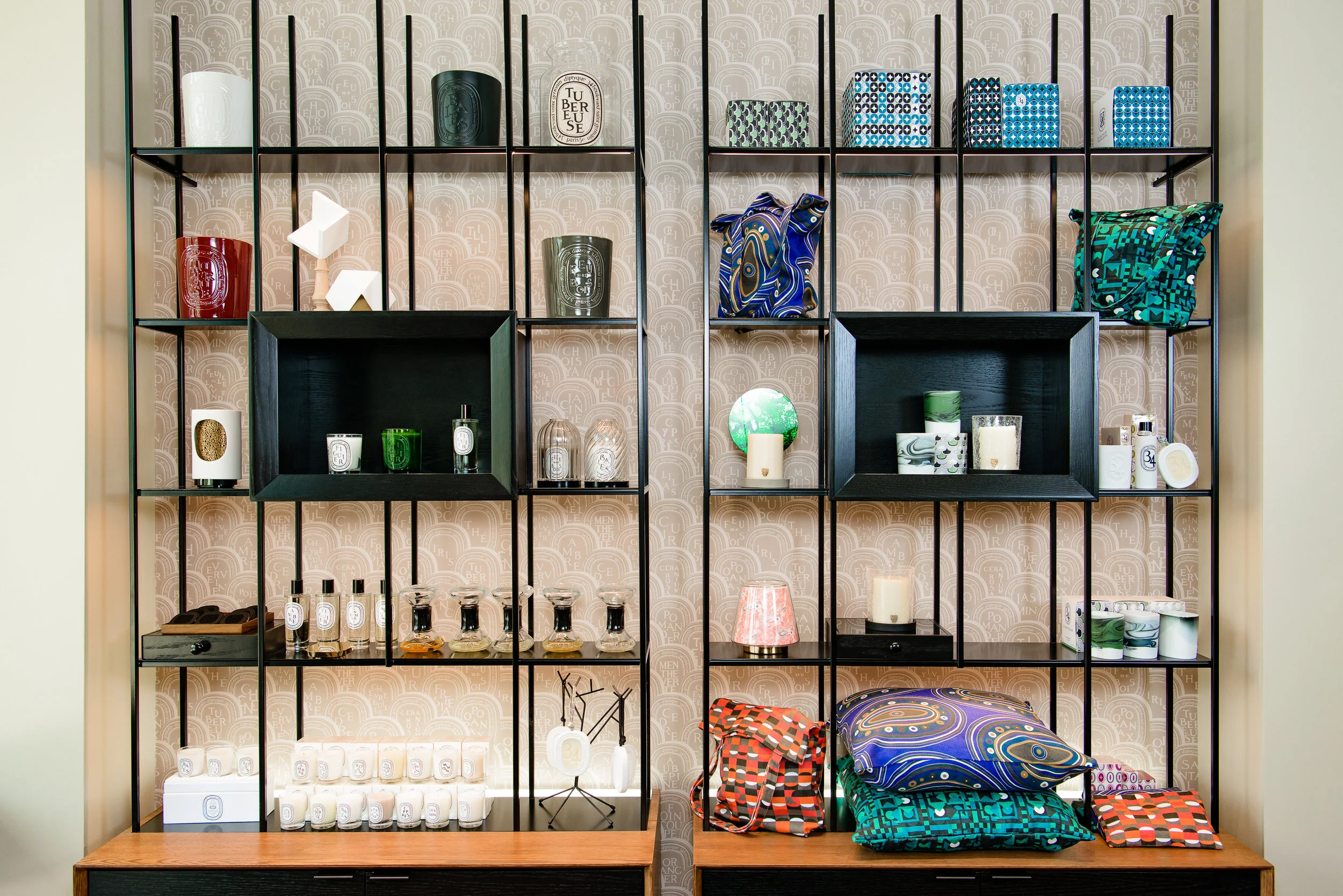 Product wall with metal and wood display case