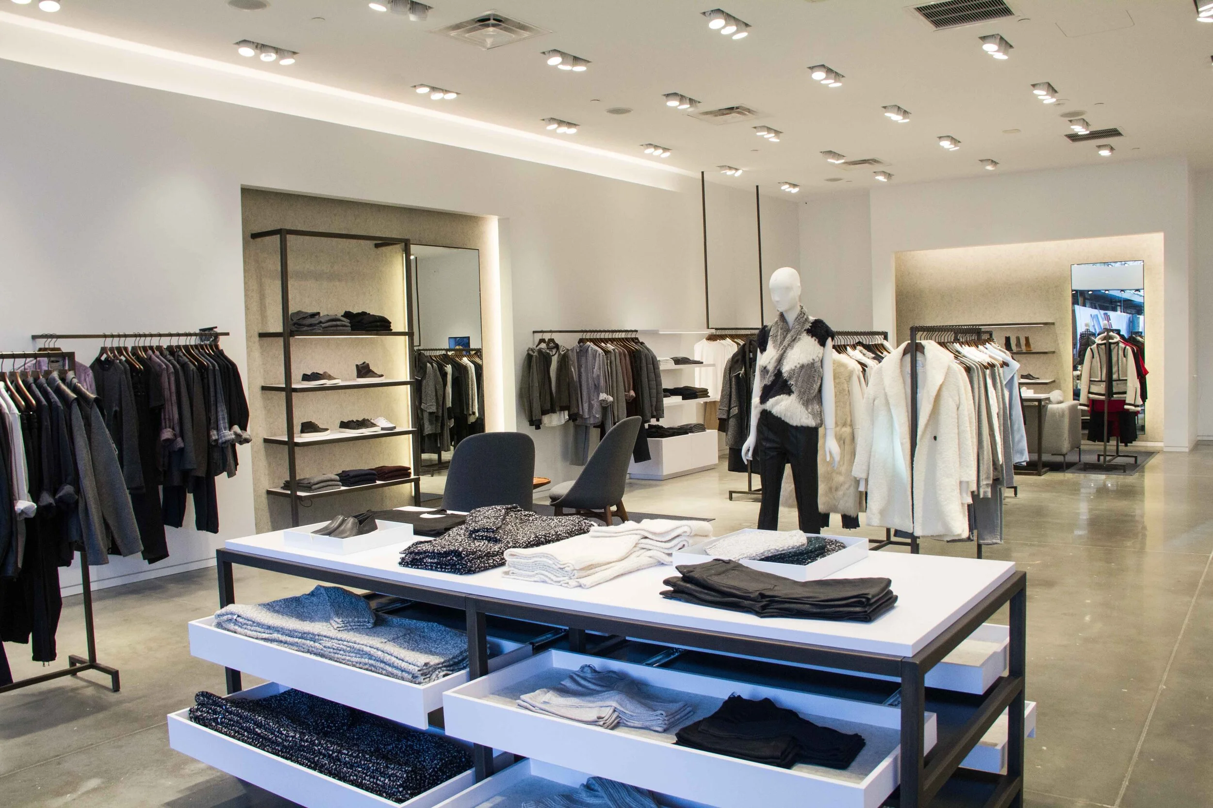 Product display tables with pull out drawers