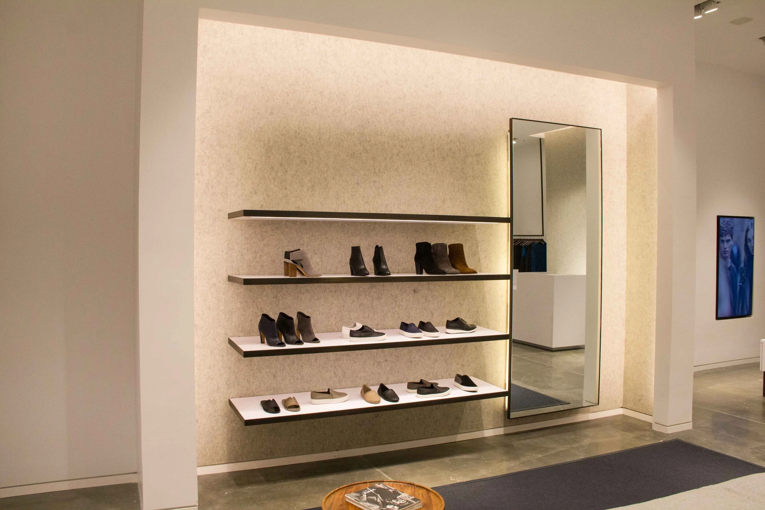 Shoe wall with floating shelves, full length mirror and back lighting
