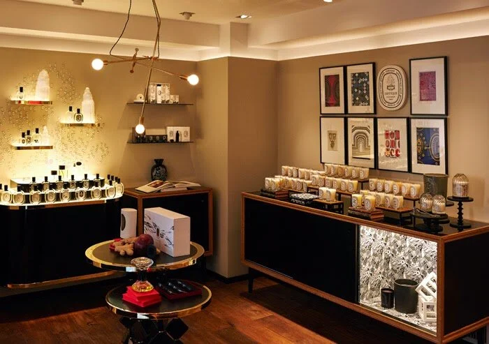 Circular product tables and cabinets along the walls